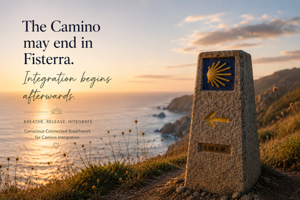 Camino marker in Fisterra at sunset symbolizing Camino integration and conscious connected breathwork.